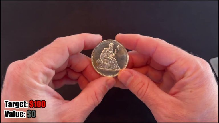 Hands holding an old silver coin with on-screen text showing target price and value