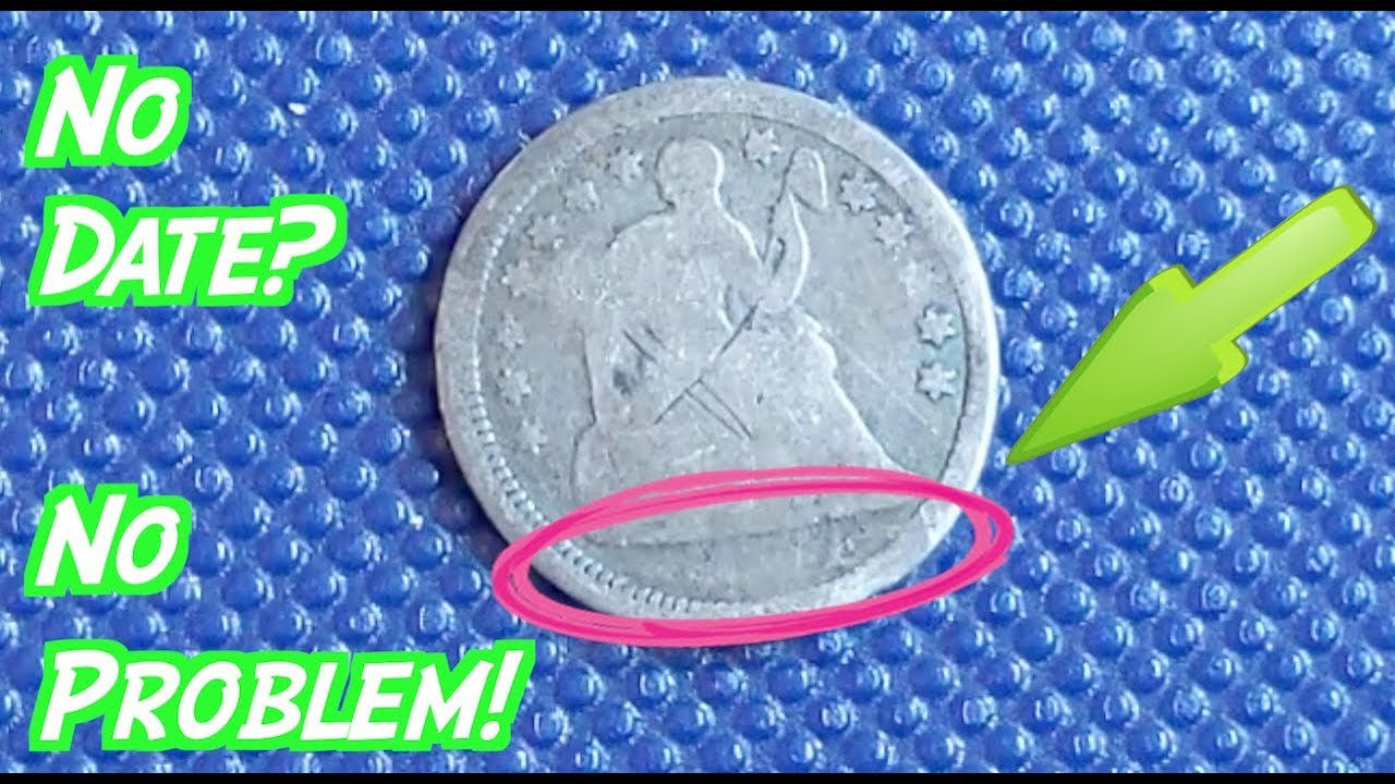 Worn silver coin with missing date markings